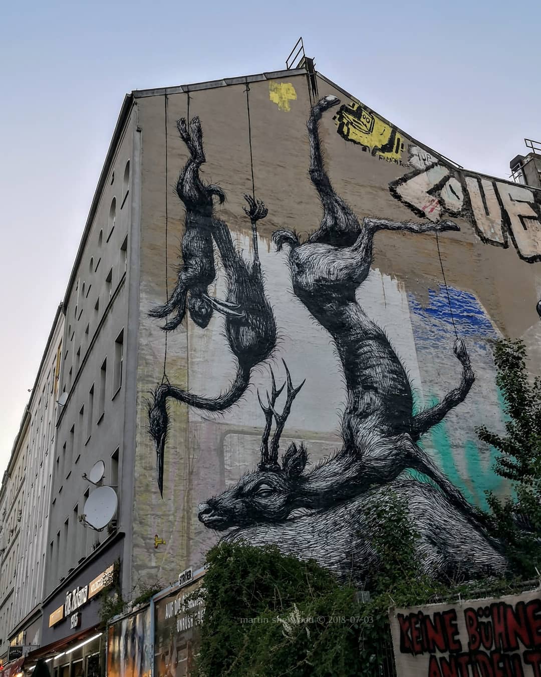 ROA Hanging Animals